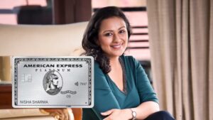 Smiling professional woman relaxing indoors, with a prominent graphic of the American Express Platinum Travel Credit Card overlaid.