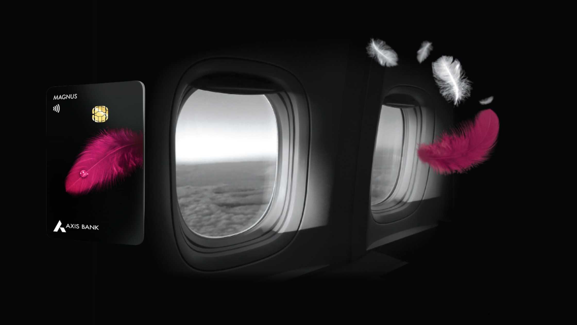 A black Axis Bank Magnus Credit Card with a pink feather design floating next to two dark airplane windows, suggesting high-end air travel.