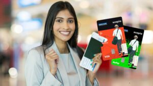 A happy traveller holding a passport with two Scapia Federal Bank credit cards, highlighting travel benefits and lounge access.